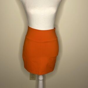 BeBe Orange Skirt w/Black Zipper
